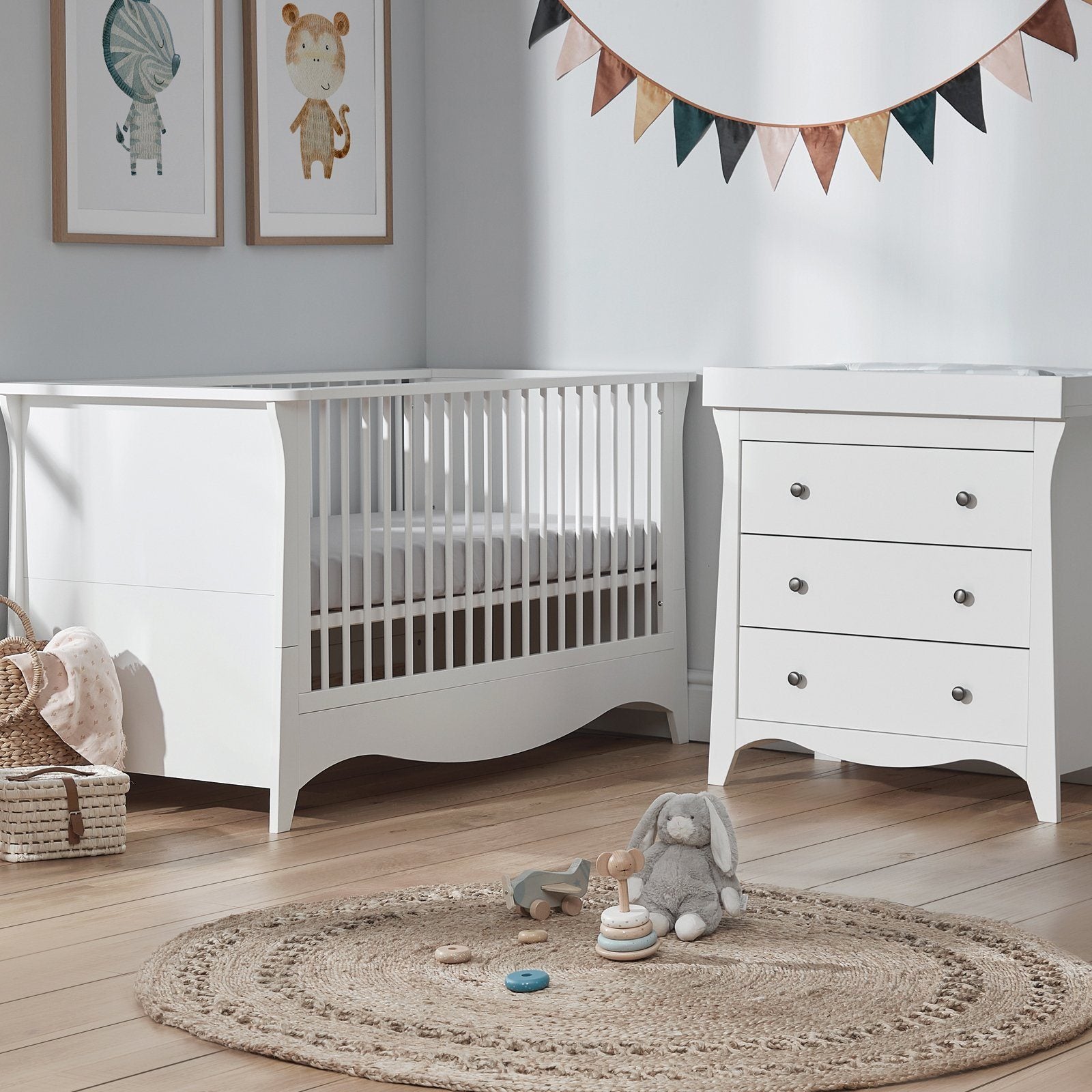 Clara Nursery Furniture Set (white Cot Bed & Dresser) in nursery room.