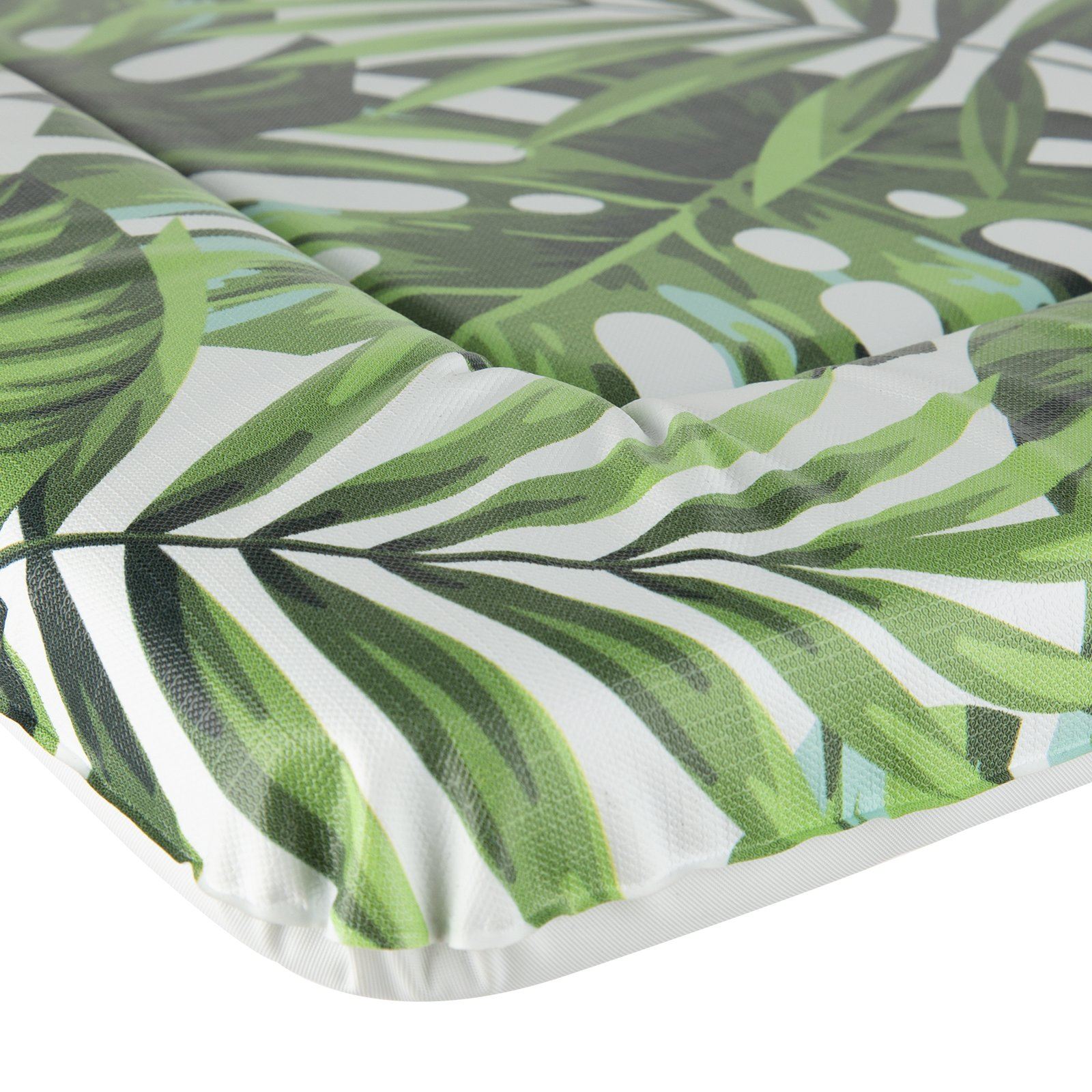 Close up of changing mat with tropics leaf design