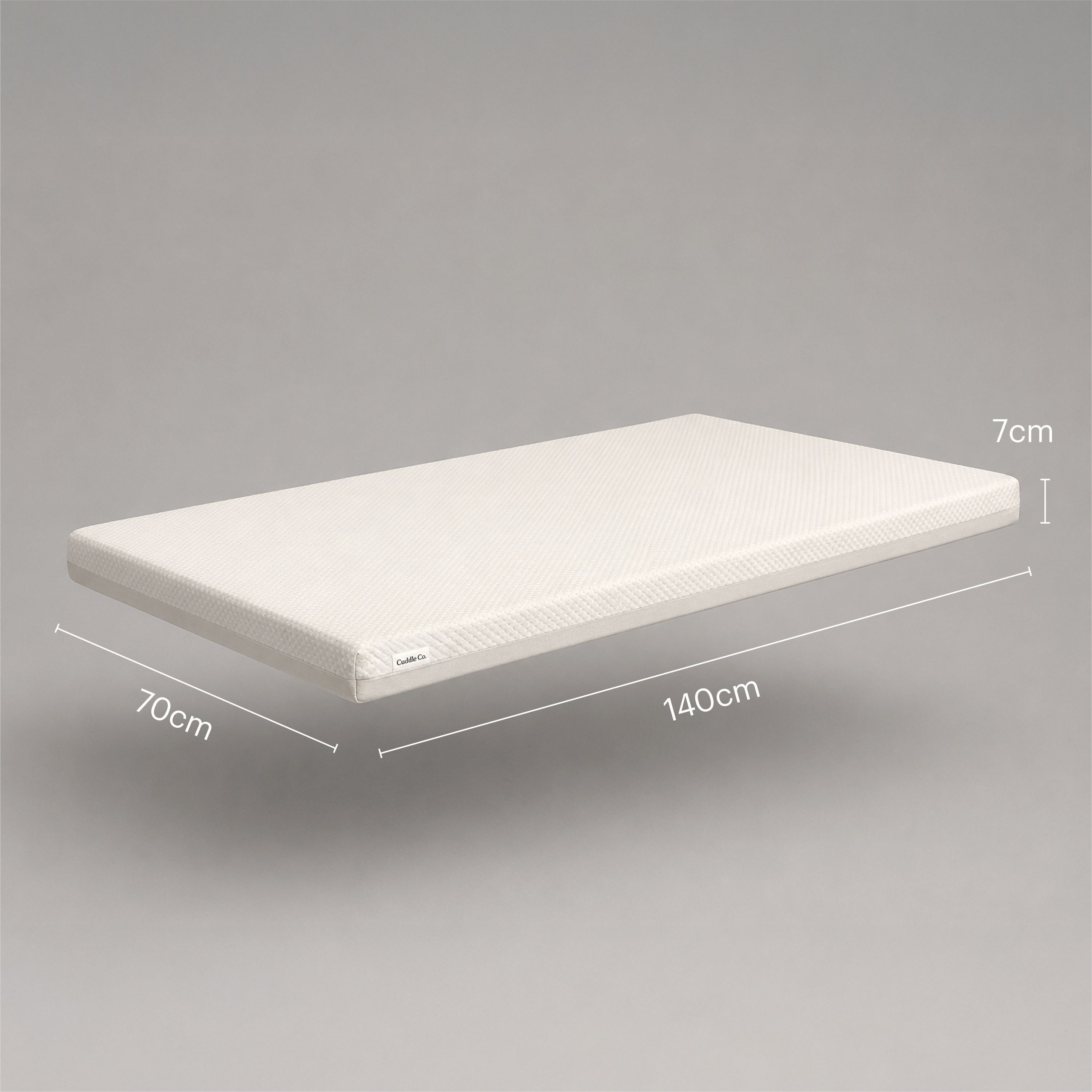 A white mattress shown floating on a light gray background with dimension lines and labels indicating 140 cm length, 70 cm width, and 7 cm height.
