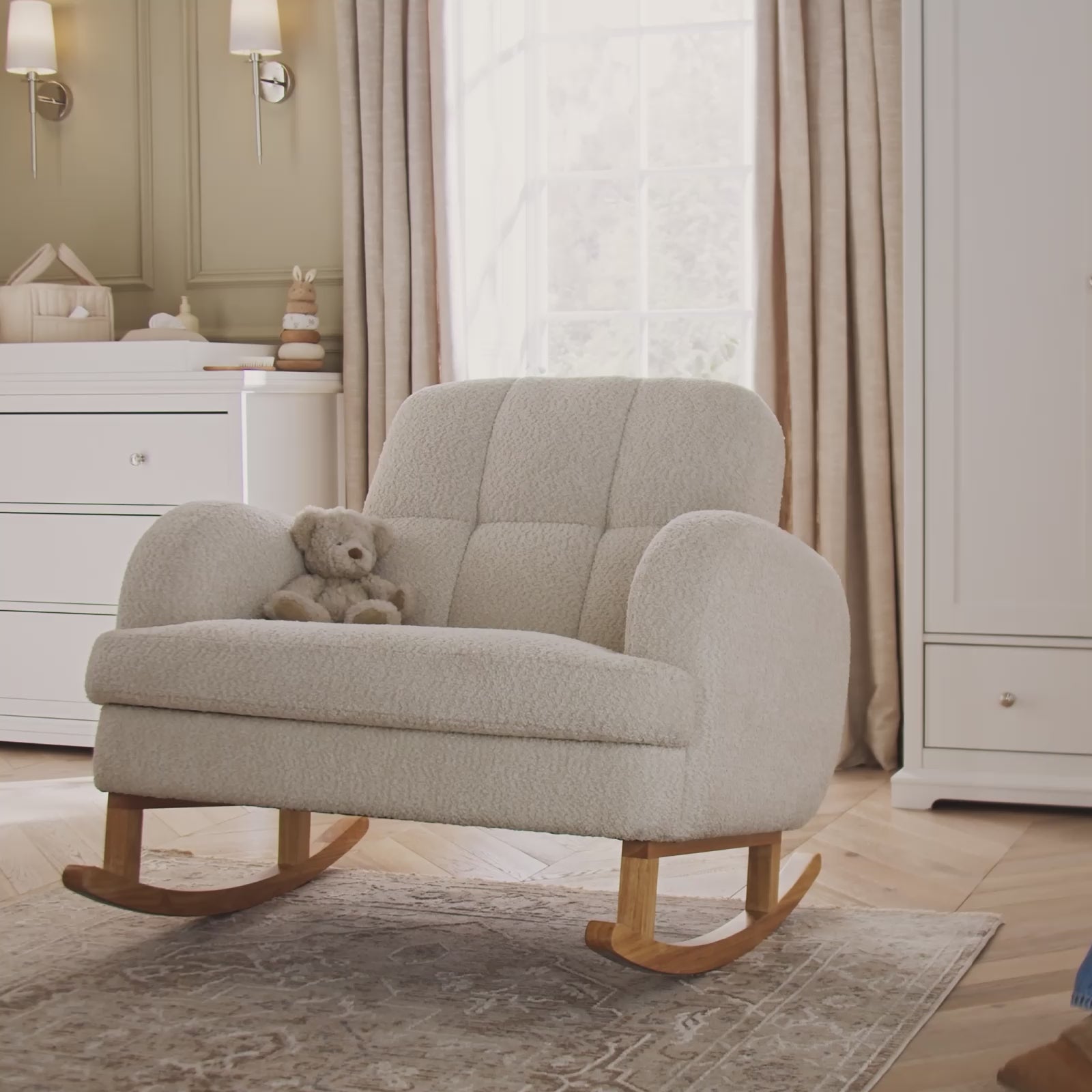 Extra wide nursing chair being used by a mother and baby