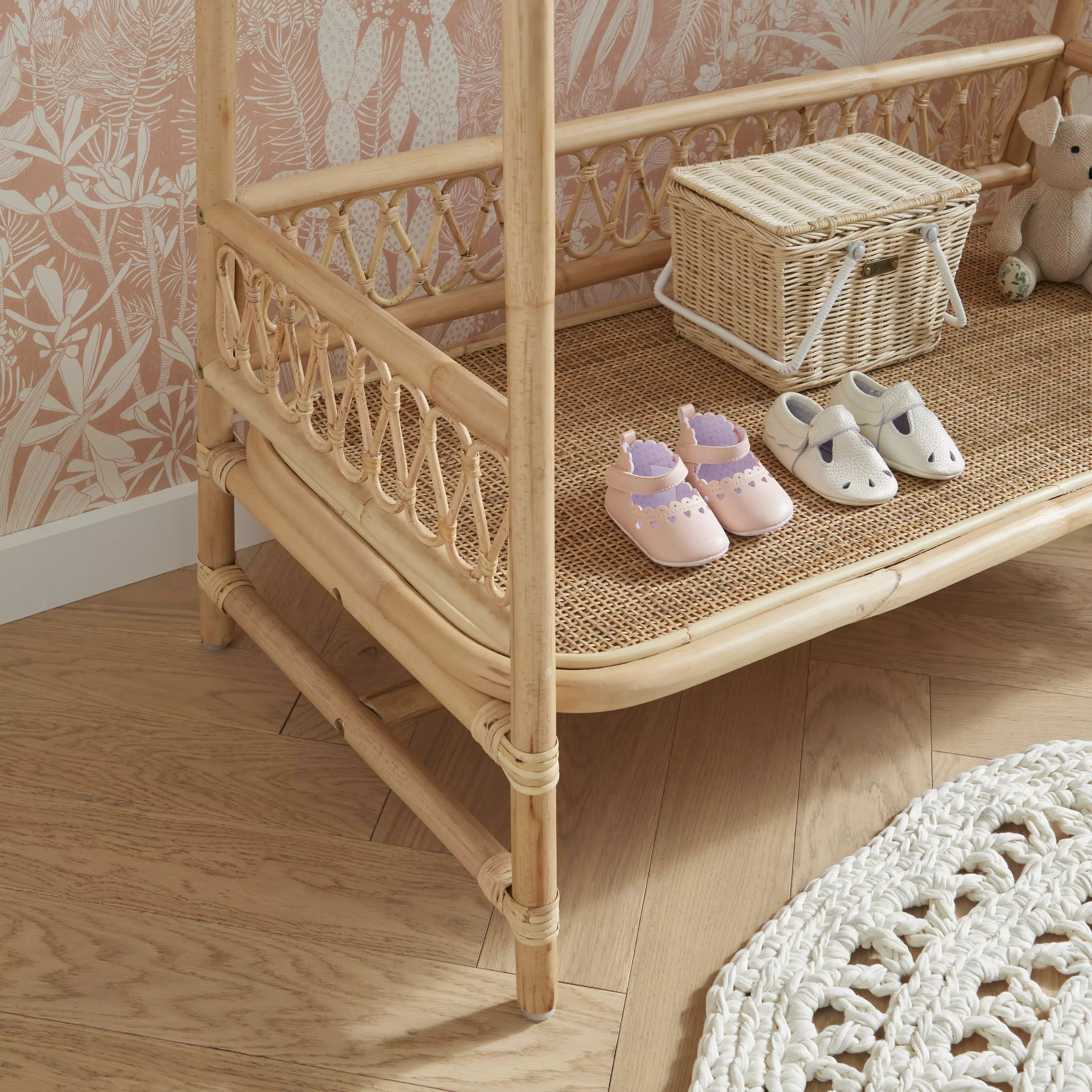 Changing table next to top crib