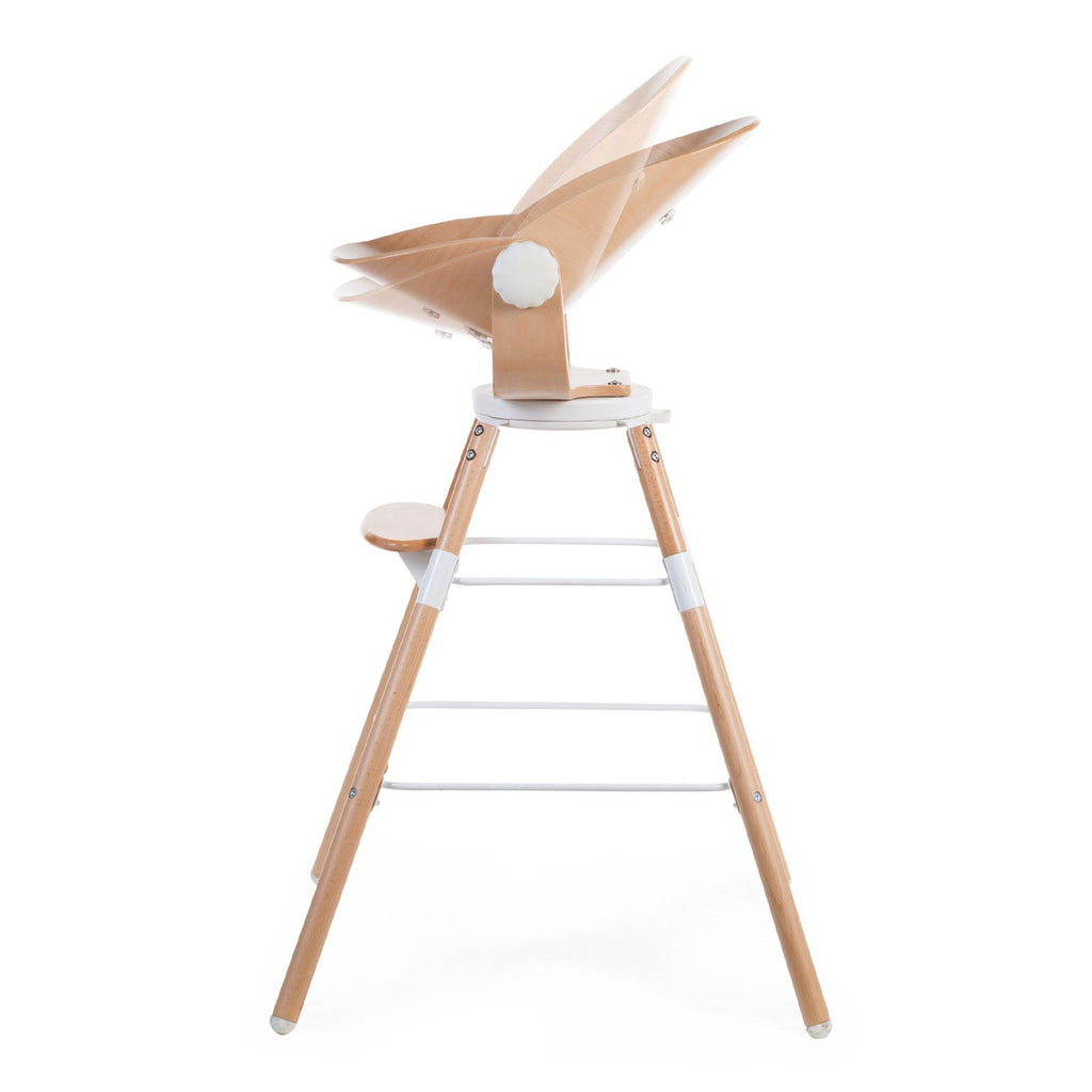 Evolu Newborn Seat Natural installed on the Evolu high chair in white by Childhome 